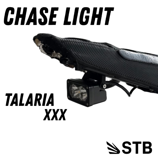 Talaria X3 chase light mounted under rear subframe