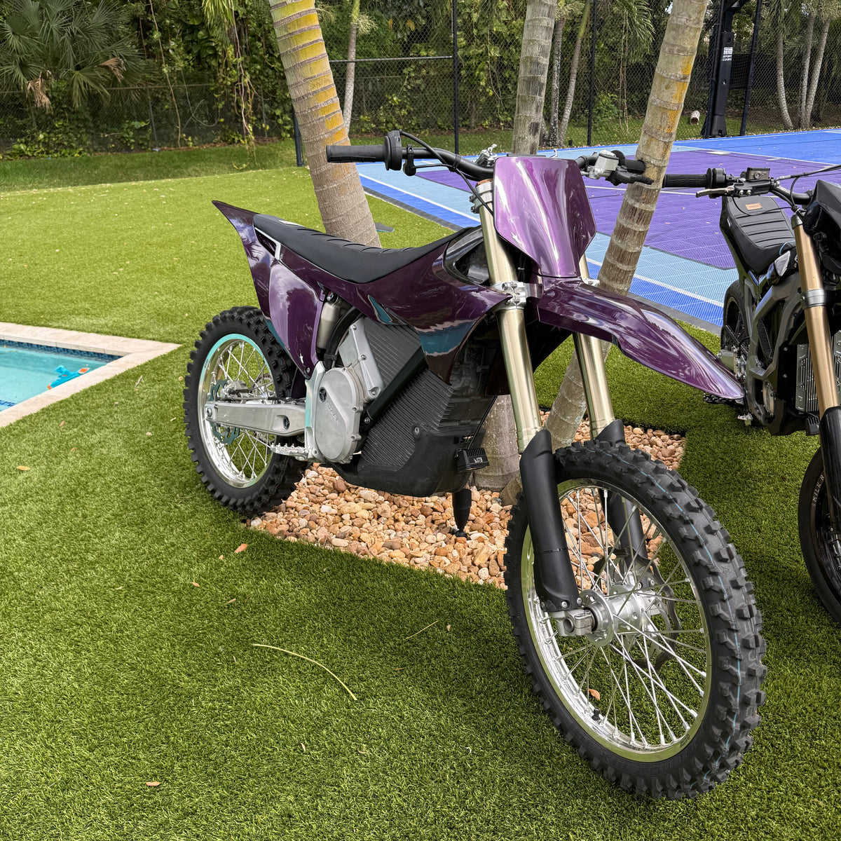 Battery powered wheelie light installed on an electric dirt bike