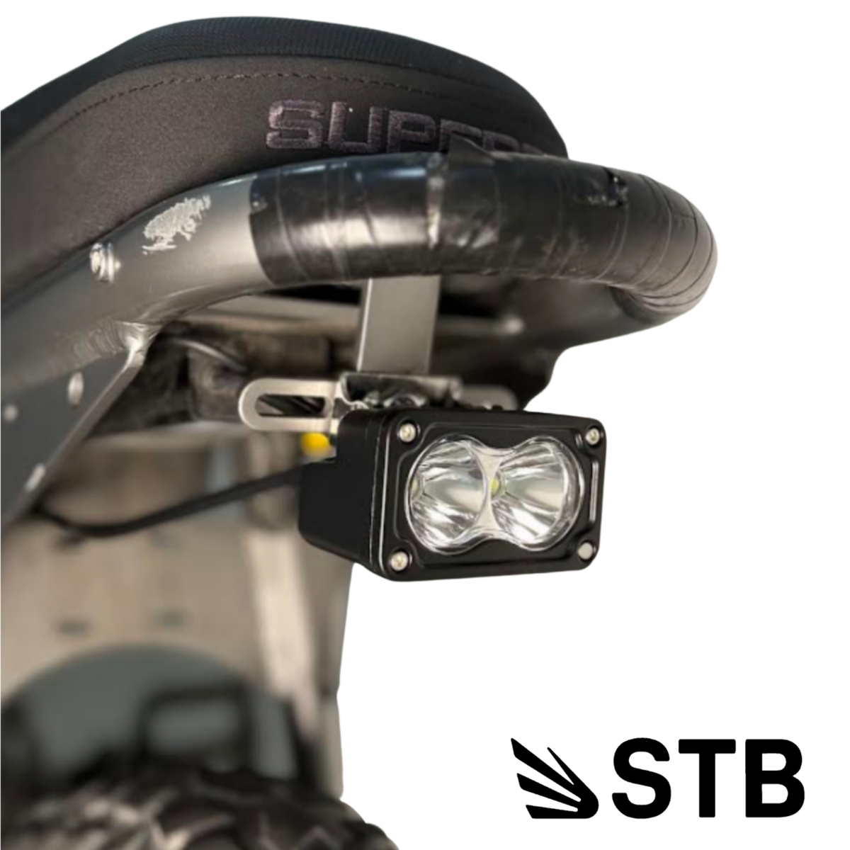 Close-up of Super73 chase light installed beneath the rear seat