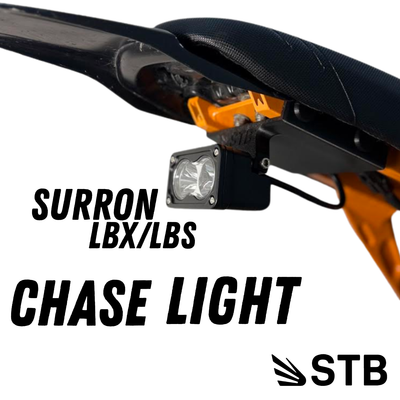 Sur-Ron LBX chase light mounted under rear subframe