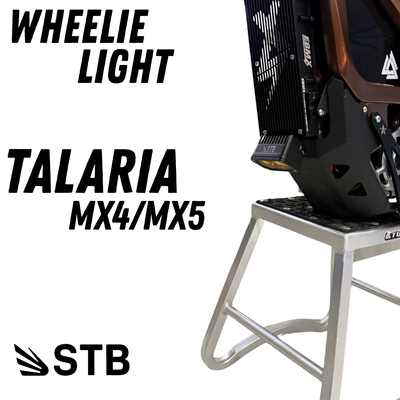 Talaria MX4 and MX5 wheelie light mounted under the bash guard