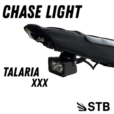 Talaria X3 chase light mounted under rear subframe